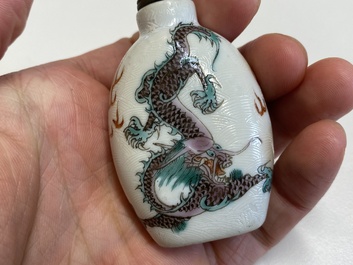 Four Chinese famille rose and verte snuff bottles, 19th C.