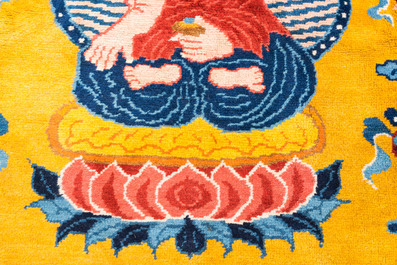 A huge Chinese 'Medicine Buddha' or 'Bhaishajyaguru' yellow-ground rug, probably Ningxia, 19/20th C.