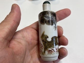 Four Chinese famille rose and verte snuff bottles, 19th C.