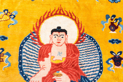 A huge Chinese 'Medicine Buddha' or 'Bhaishajyaguru' yellow-ground rug, probably Ningxia, 19/20th C.
