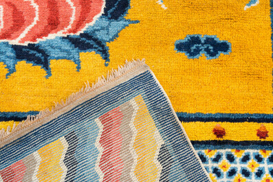 A huge Chinese 'Medicine Buddha' or 'Bhaishajyaguru' yellow-ground rug, probably Ningxia, 19/20th C.