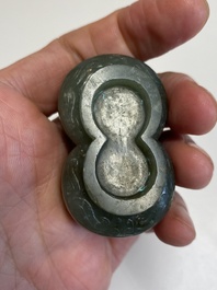 A Chinese reticulated white jade parfumier with spinach-green jade cover and base, Qing