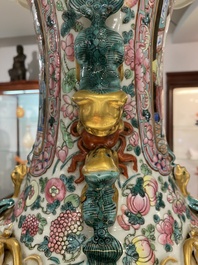 A large Chinese famille rose vase with palace scenes, 19th C.