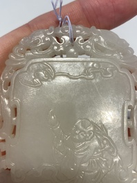 A Chinese reticulated white jade plaque, Qing