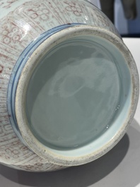A Chinese copper-red bottle vase with floral scrolls, Qianlong