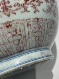 A Chinese copper-red bottle vase with floral scrolls, Qianlong