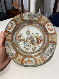 A Chinese famille rose plate with musicians playing the drums, Yongzheng