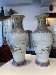 A pair of fine Chinese famille rose 'landscape' vases, Qianlong mark, 20th C.