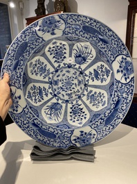 An exceptionally large Chinese blue and white 'peacock rim' dish, Kangxi