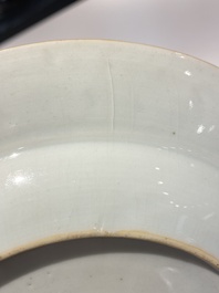 A Chinese famille rose plate with musicians playing the drums, Yongzheng
