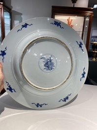 An exceptionally large Chinese blue and white 'peacock rim' dish, Kangxi