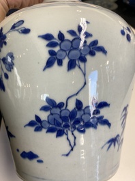 A Chinese blue and white bottle vase with floral designs, Transitional period