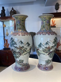 A pair of fine Chinese famille rose 'landscape' vases, Qianlong mark, 20th C.