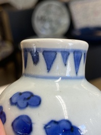 A Chinese blue and white bottle vase with floral designs, Transitional period