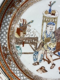 A Chinese famille rose plate with musicians playing the drums, Yongzheng