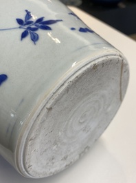 A Chinese blue and white bottle vase with floral designs, Transitional period