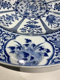 An exceptionally large Chinese blue and white 'peacock rim' dish, Kangxi