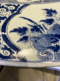 An exceptionally large Chinese blue and white 'peacock rim' dish, Kangxi