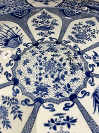 An exceptionally large Chinese blue and white 'peacock rim' dish, Kangxi
