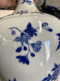 A Chinese blue and white bottle vase with floral designs, Transitional period