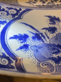 An exceptionally large Chinese blue and white 'peacock rim' dish, Kangxi