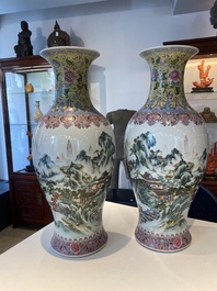 A pair of fine Chinese famille rose 'landscape' vases, Qianlong mark, 20th C.