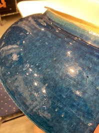 A very large Chinese monochrome blue-glazed dish, Kangxi