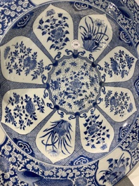 An exceptionally large Chinese blue and white 'peacock rim' dish, Kangxi