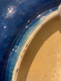 A very large Chinese monochrome blue-glazed dish, Kangxi