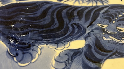 A large Japanese Arita blue and white 'tiger' dish, Fuuki Chousun 富貴長春 mark, 18/19th C.