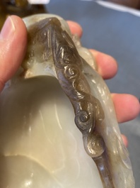 A Chinese white and russet jade lotus-form brush washer, Qing