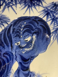 A large Japanese Arita blue and white 'tiger' dish, Fuuki Chousun 富貴長春 mark, 18/19th C.
