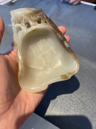 A Chinese white and russet jade lotus-form brush washer, Qing
