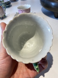 Two Chinese relief-decorated famille rose 'lotus' cups and saucers and two jugs, Yongzheng