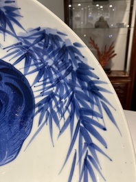 A large Japanese Arita blue and white 'tiger' dish, Fuuki Chousun 富貴長春 mark, 18/19th C.