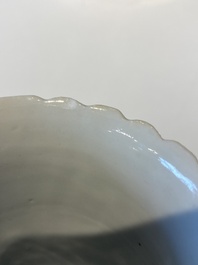 Two Chinese relief-decorated famille rose 'lotus' cups and saucers and two jugs, Yongzheng