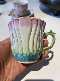 Two Chinese relief-decorated famille rose 'lotus' cups and saucers and two jugs, Yongzheng