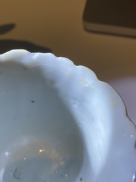 Two Chinese relief-decorated famille rose 'lotus' cups and saucers and two jugs, Yongzheng