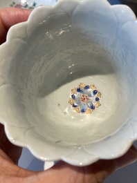 Two Chinese relief-decorated famille rose 'lotus' cups and saucers and two jugs, Yongzheng