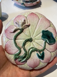 Two Chinese relief-decorated famille rose 'lotus' cups and saucers and two jugs, Yongzheng