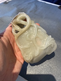 A Chinese white and russet jade lotus-form brush washer, Qing