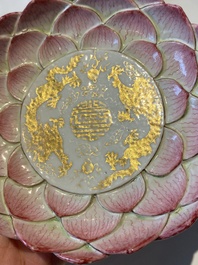 Two Chinese relief-decorated famille rose 'lotus' cups and saucers and two jugs, Yongzheng