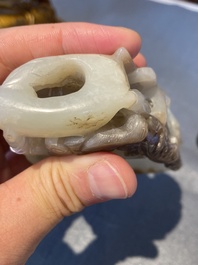 A Chinese white and russet jade lotus-form brush washer, Qing