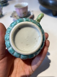 Two Chinese relief-decorated famille rose 'lotus' cups and saucers and two jugs, Yongzheng