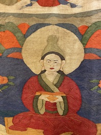 A Chinese kesi silk weaving depicting 'Buddha sitting on a lotus throne', Qing