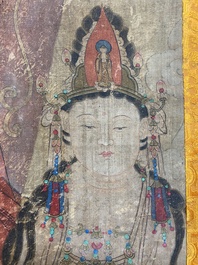 Chinese school: 'Buddha standing on two lotus flowers', ink and colour on silk, 18/19th C.