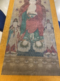 Chinese school: 'Buddha standing on two lotus flowers', ink and colour on silk, 18/19th C.
