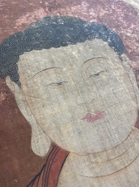 Chinese school: 'Buddha standing on two lotus flowers', ink and colour on silk, 18/19th C.