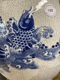 A large Chinese blue and white crackle-glazed 'carps' vase with fine gilt bronze mounts, 18/19th C.