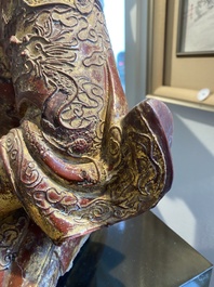 A large Chinese lacquered and polychromed wood sculpture of Guandi, 18th C.